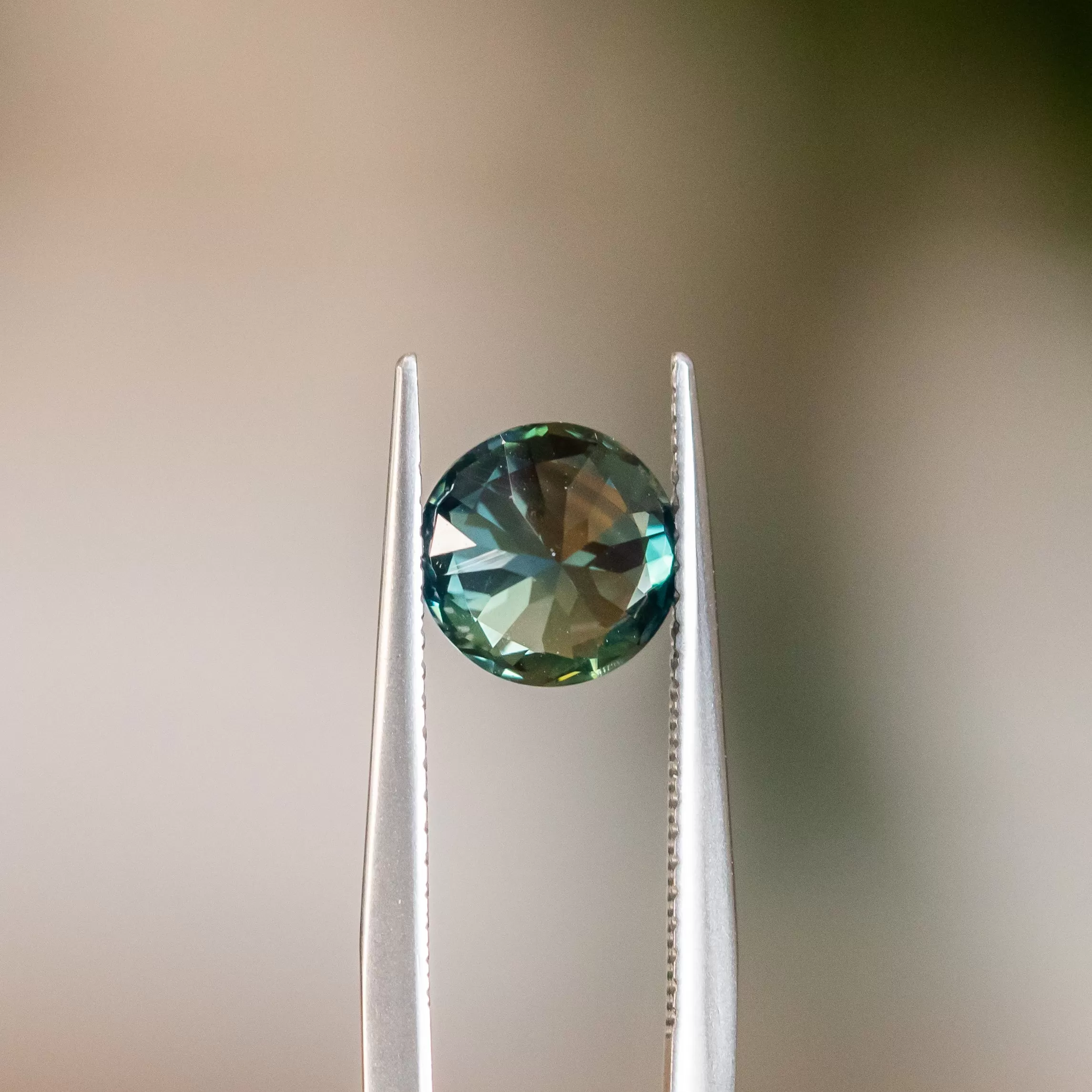 1.70CT ROUND SAPPHIRE, MEDIUM GREEN TEAL, 7.24X4.43MM